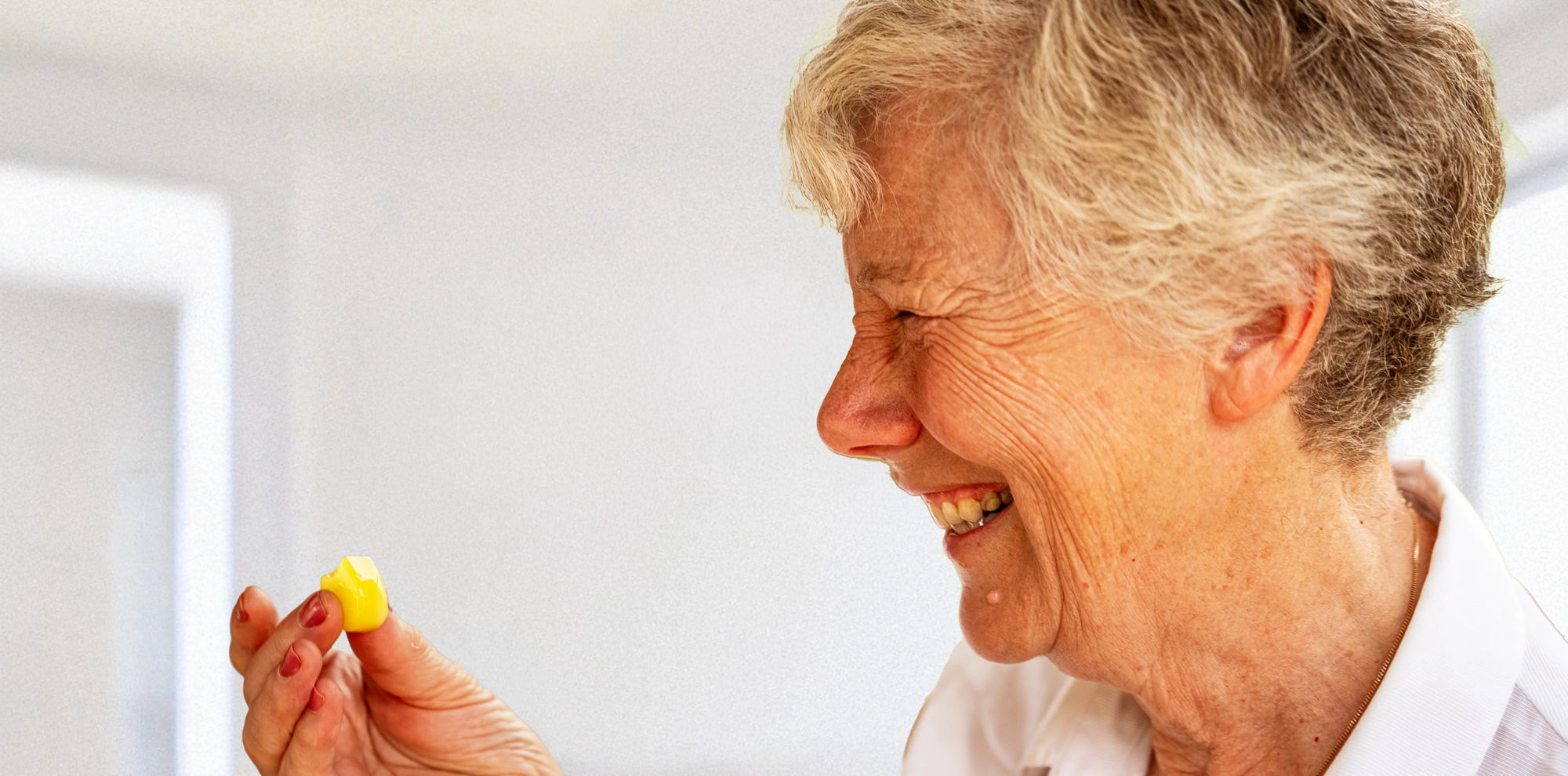 Woman holding a lemon Jelly Drop